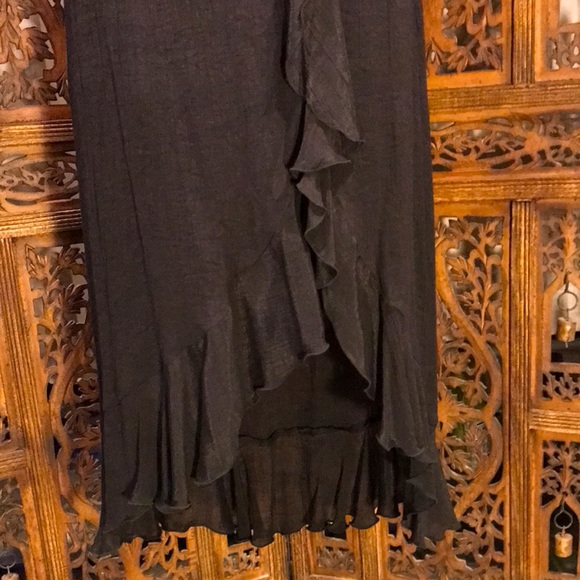 Black Skirt with High-Low Hemline and front slit with cascading ruffles. - Picture 3 of 14